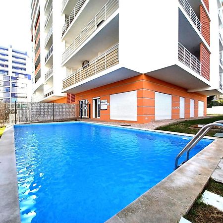 Edificio Lumina Sunshine Beach Apartment Портиман Экстерьер фото