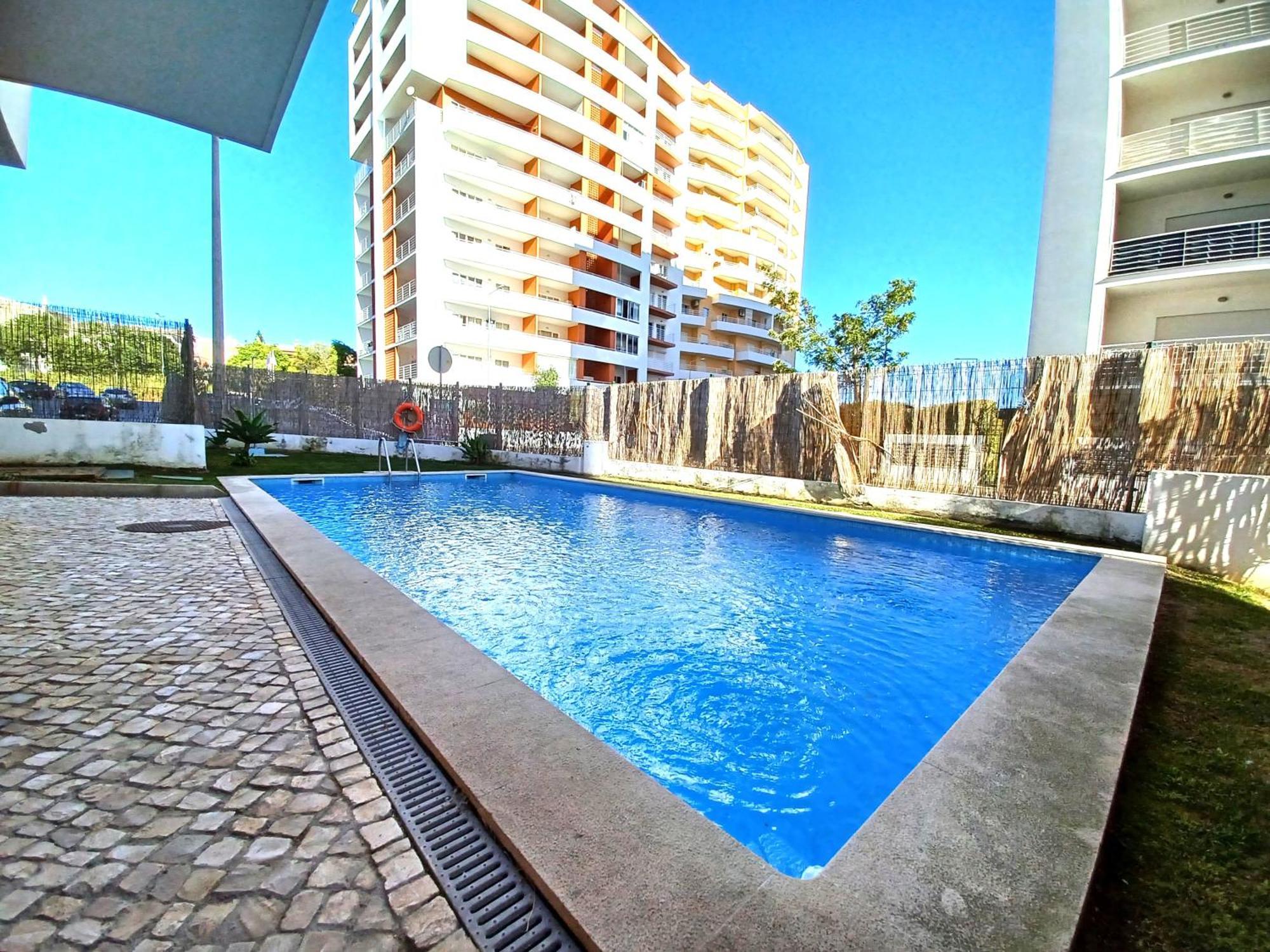 Edificio Lumina Sunshine Beach Apartment Портиман Экстерьер фото